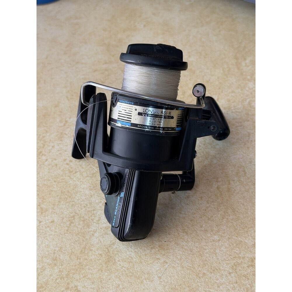 Vintage Daiwa Long Cast-X DC 75X Spinning Fishing Reel Ball Bearing Graphite - Picture 4 of 11